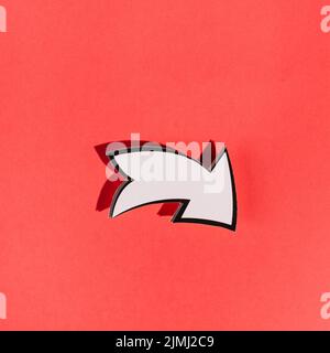 White directional arrow red background Stock Photo