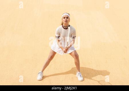 Young tennis player waiting ball Stock Photo