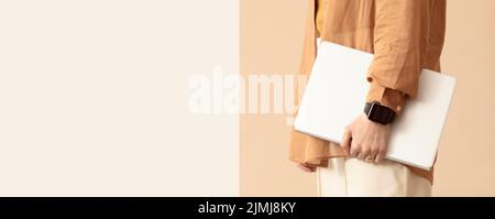 Person holding laptop protective case copy space Stock Photo