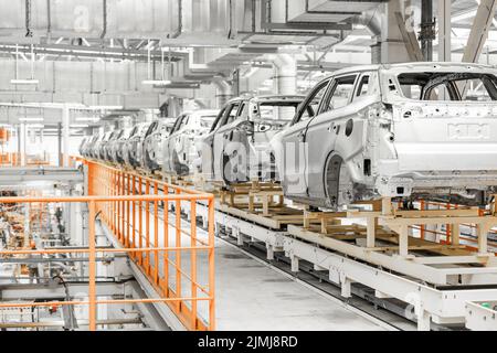 Photo of automobile production line. Welding car body. Modern car assembly plant. Auto industry. High-tech factory Stock Photo