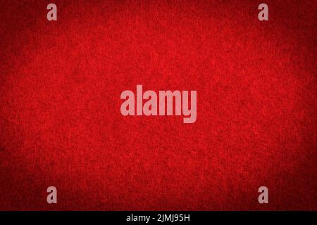 Red paper with vignette, a background or texture Stock Photo