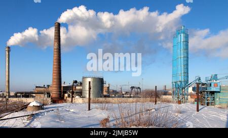 Very small Cement Factory with two silos Stock Photo