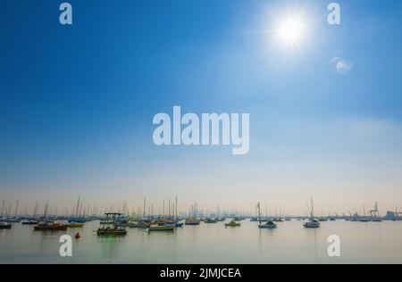 Boats moored in a calm harbour Stock Photo