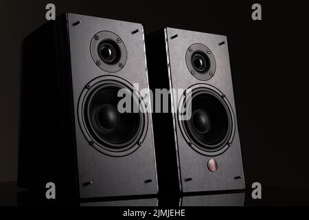 An image photograph of a pair of hi-fi level music speakers with two speakers on a black background Stock Photo