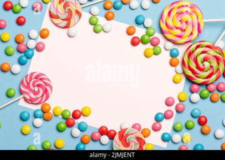 Flat lay delicious colorful candies Stock Photo