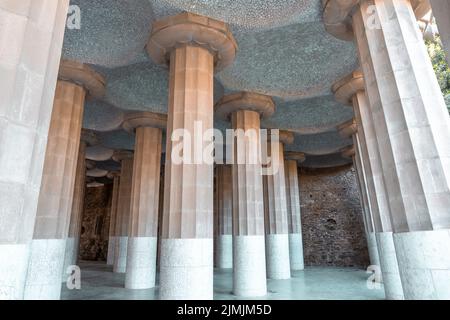 Columns and ceiling in Park Guell designed with details and precision Stock Photo