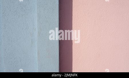 A pink and blue painted wall Stock Photo