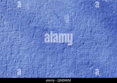 Texture of rough blue plaster. Architectural abstract background. Stock Photo