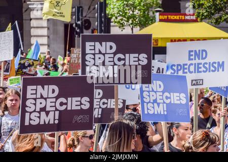 London, UK. 06th Aug, 2022. Protesters hold 'End speciesism' placards during the demonstration in Piccadilly Circus. Thousands of people marched through central London in support of animal rights and veganism, and called for an end to speciesism and all forms of animal exploitation. Credit: SOPA Images Limited/Alamy Live News Stock Photo