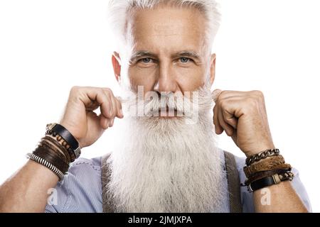 Handsome bearded senior man on white background Stock Photo