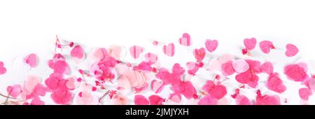 Valentine day or wedding panorama with pink hearts and flowers confetti Stock Photo