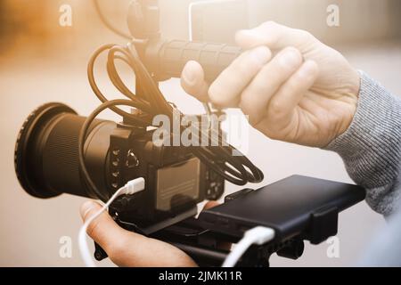 Videographer with a modern mirrorless camera rig Stock Photo