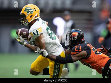 BC Lions' Delvin Breaux Sr. (left) goes up to break up the pass to Toronto  Argonauts' Brandon Banks during first half of CFL football action in  Vancouver, B.C., Saturday, June 25, 2022.