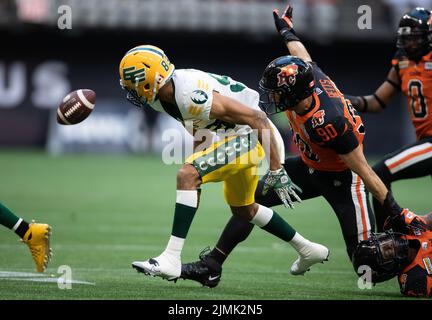 BC Lions' Delvin Breaux Sr. (left) goes up to break up the pass to Toronto  Argonauts' Brandon Banks during first half of CFL football action in  Vancouver, B.C., Saturday, June 25, 2022.