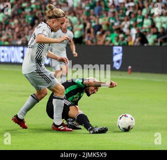 Austin, Texas, USA. 6th Aug, 2022. Austin FC forward Diego FagÃºndez (14) takes the ball away from San Jose Earthquakes forward Tommy Thompson (22) during a Major League Soccer match on August 6, 2022 in Austin, Texas. The match finished in a 3-3 draw. (Credit Image: © Scott Coleman/ZUMA Press Wire) Stock Photo