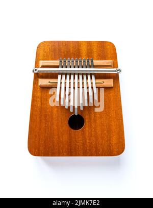 Traditional wooden kalimba isolated on white Stock Photo