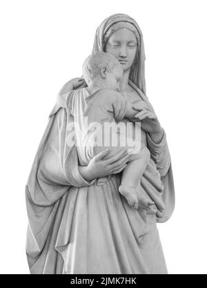 Ancient statue of the mother Vigin Mary carrying the baby Jesus Isolated on white background with clipping path. Religion sculpt Stock Photo