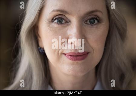 Happy pretty senior woman close up facial portrait Stock Photo