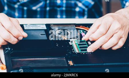 computer repair shop disassembled parts technician Stock Photo