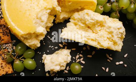 Organic homemade cheese at the cheese fair. Healthy food manufacture