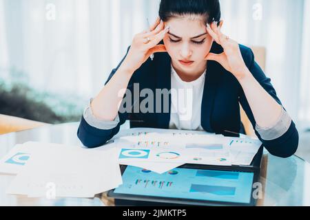paperwork deadlines stressed business lady office Stock Photo