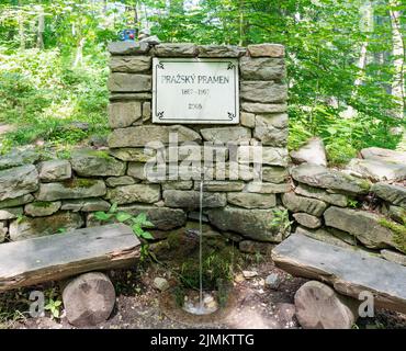 JESENIK SPA - CZECH REPUBLIC - JULY 18, 2022: Prazsky pramen, Prague stream. The  healing spring water, Prazsky Quelle Stock Photo