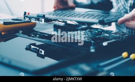 tech service computer maintenance engineer laptop Stock Photo