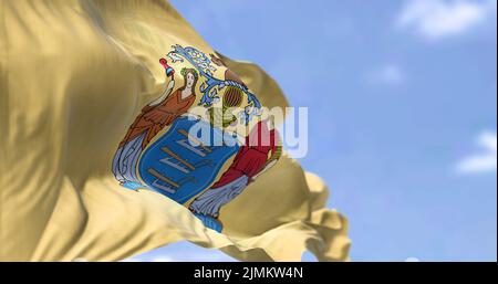 The US state flag of New Jersey waving in the wind Stock Photo