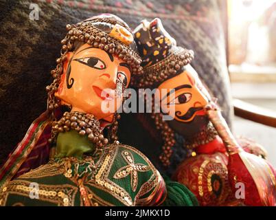 The heads of two original traditional Indian Folk Art Puppets. They are repaired, since the heads fell almost from the bodies when we found them Stock Photo