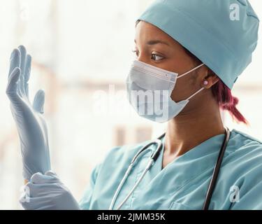 Close up health worker with gloves Stock Photo