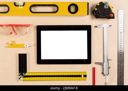 Tablet architect desk with tools mock up Stock Photo