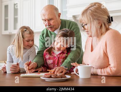 Medium shot grandparents girls Stock Photo