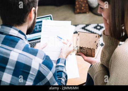 From couple with mortgage agreement Stock Photo