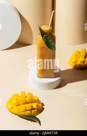 High angle mango juice bottle Stock Photo