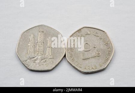 Modern United Arab Emirates dirham coins used closeup on the white background Stock Photo