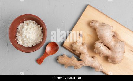 Top view arrangement with turmeric cutting board Stock Photo