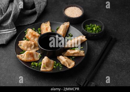 High angle asian dumplings dish with herbs Stock Photo