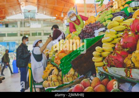 Arequipa, Peru - Aug, 2022: Fresh fruit and vegetable produce on sale in the central market, Mercado San Camilo. Stock Photo