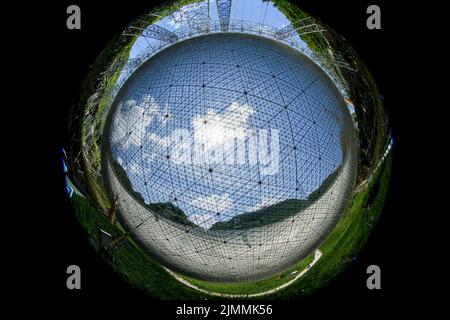 (220806) -- GUIZHOU, Aug. 6, 2022 (Xinhua) -- Photo taken with a fisheye lens on July 21, 2022 shows an interior view of China's Five-hundred-meter Aperture Spherical Radio Telescope (FAST) under maintenance in southwest China's Guizhou Province.  Located in a naturally deep and round karst depression in southwest China's Guizhou Province, FAST started formal operation in January 2020 and officially opened to the world on March 31, 2021. It is believed to be the world's most sensitive radio telescope. With FAST, scientists have identified over 660 new pulsars. (Xinhua/Ou Dongqu) Stock Photo