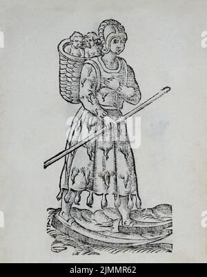 An very early image of a female native Laplander, Sami people, with two babies in the basket on her back, fur skirt, skies in her feet and a skiing po Stock Photo
