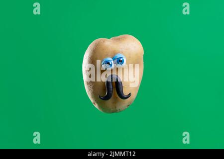 Funny potato with cute sticker Stock Photo