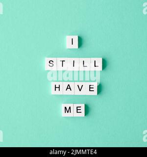 Top view letter cubes green background Stock Photo