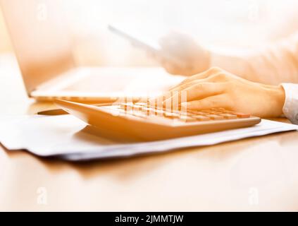 Close up businessman doing some calculations Stock Photo