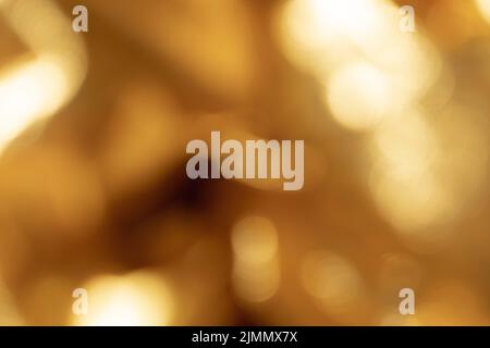 Abstract out of focus golden blurred metallic background Stock Photo
