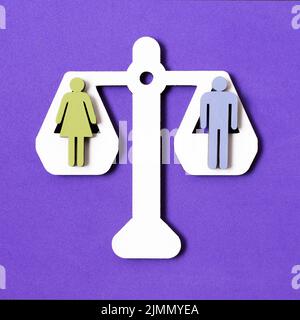 Equality man woman pair scales Stock Photo