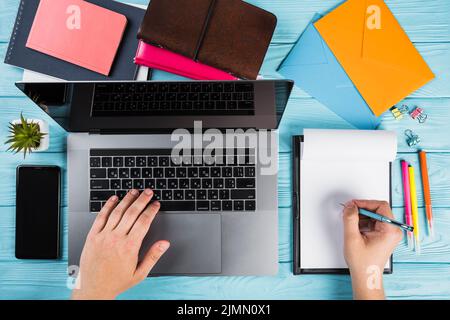Colorful office supplies with laptop Stock Photo