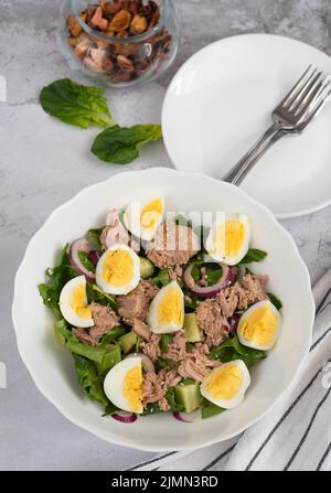 Cucumber salad with canned tuna and avocado with egg Stock Photo