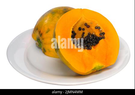 Yellow papaya cut fruit isolated on white background Stock Photo