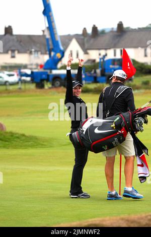 Ashleigh Buhai of South Africa celebrates scoring a hole-in-one on the 16th green during final practice round of 2011 Ricoh Women's British Open held Stock Photo