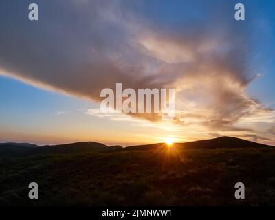 Sunset in the mountains. Scenic mountain landscape.  Carpathian, Ukraine. Stock Photo